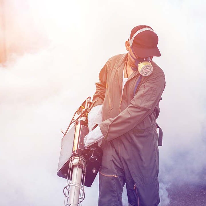 blurred-man-work-fogging-eliminate-mosquito