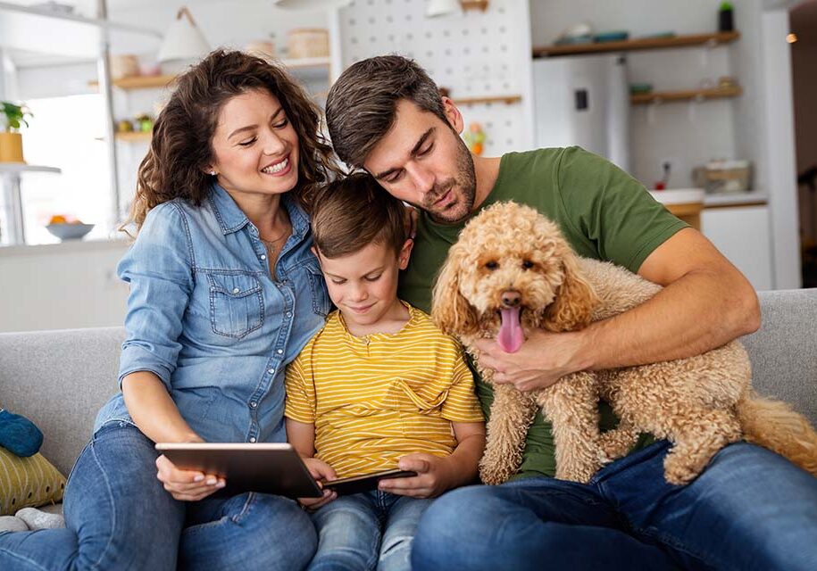 happy-family-using-technology-devices-together-home-people-education-concept